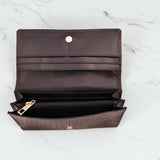 Woman’s Genuine Leather Button Tab Purse