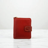 Woman’s Genuine Leather Button Tab Zip Around Wallet - Tan