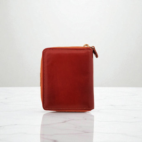 Woman’s Genuine Leather Button Tab Zip Around Wallet - Tan