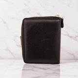 Woman’s Genuine Leather Button Tab Zip Around Wallet - Black