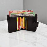 Woman’s Genuine Leather Button Tab Zip Around Wallet - Black